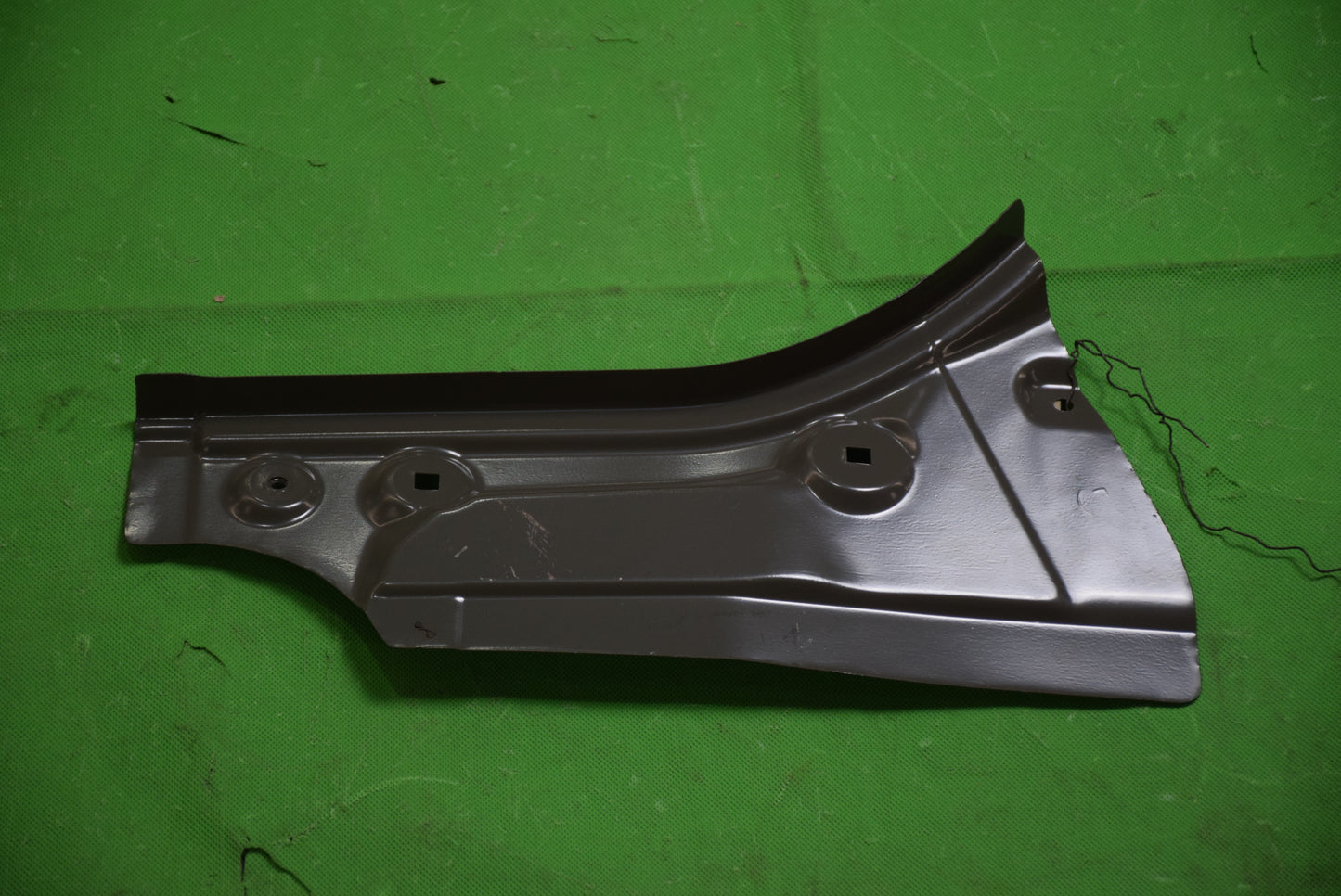 F1T1 - Lower left drip channel lower assembly